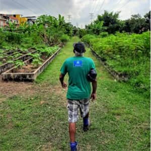 Plaatselijke manager van de tuin in Manguinhos