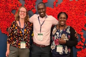 Booth of the Netherlands Embassy at IFTEX 2022 From left to right: Angela Swinkels, Geoffrey Korir (both EKN Nairobi) and Liz Kiamba