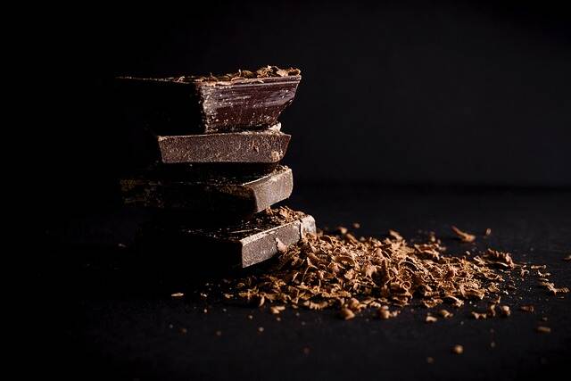 pile of chocolate on a dark background